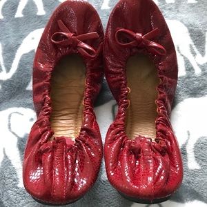 Red leather flats